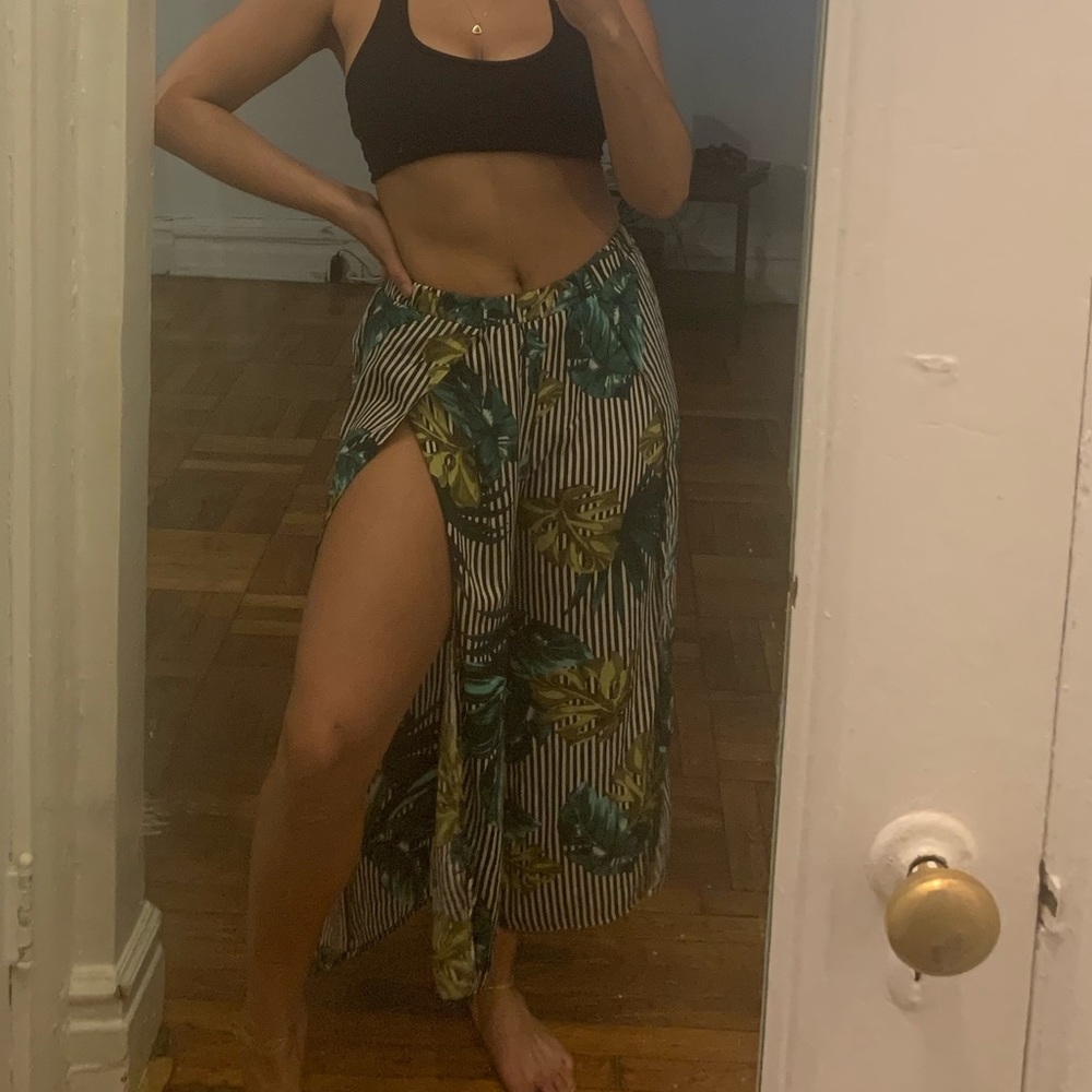 Flowy striped/leaf print pants with slots.